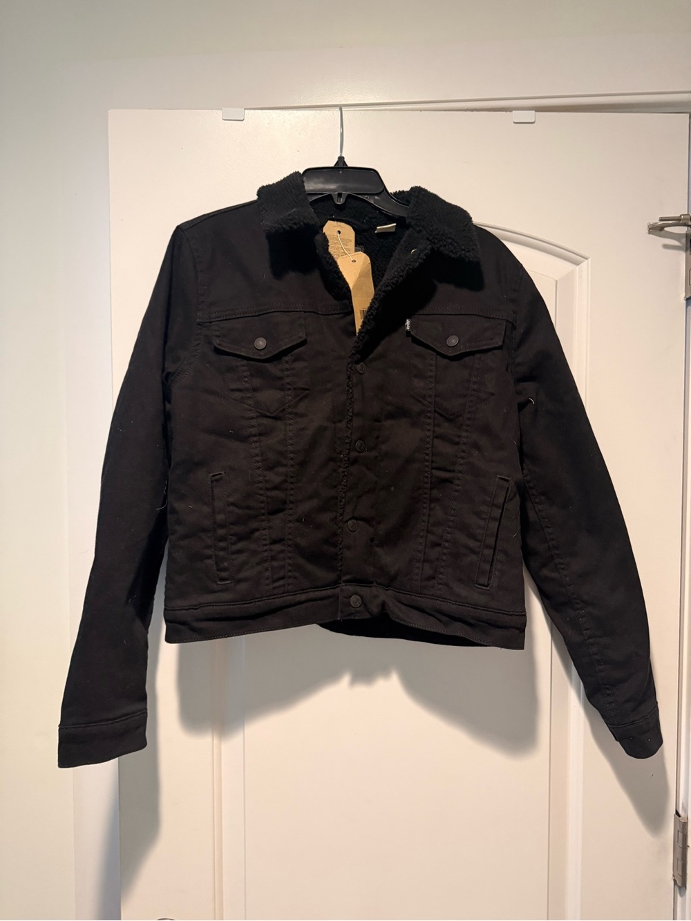 Levi’s women’s Black Sherpa-Lined Trucker Jacket